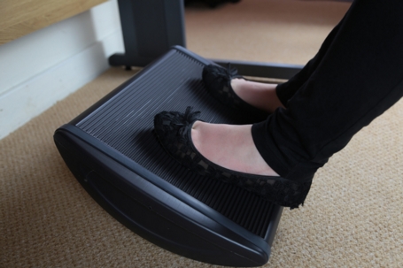 Rock the footrest to encourage movement